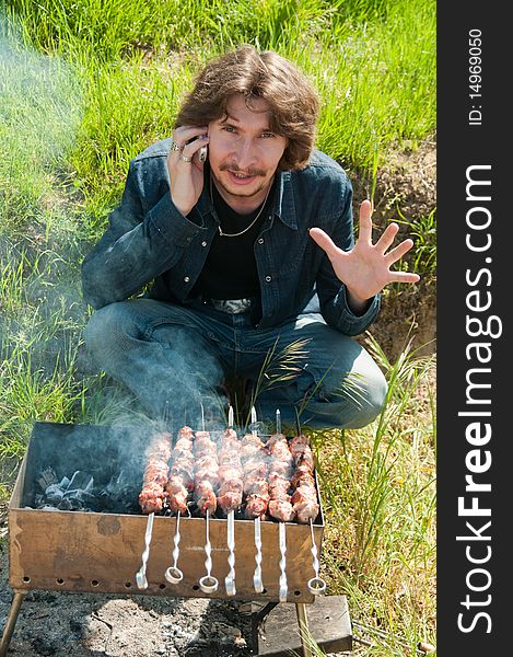 The Man Prepares A Shish Kebab.