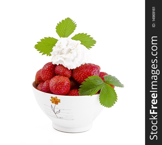 Strawberry dessert with whipped cream isolated on white