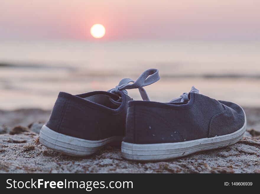 Two Sneakers At The Beach