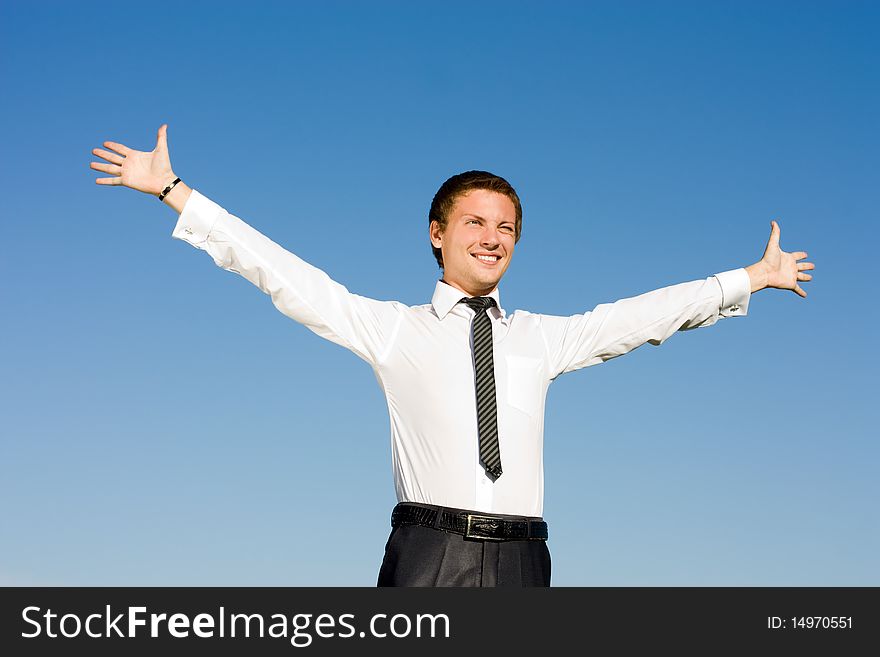 Businessman showing his success at the field. Businessman showing his success at the field