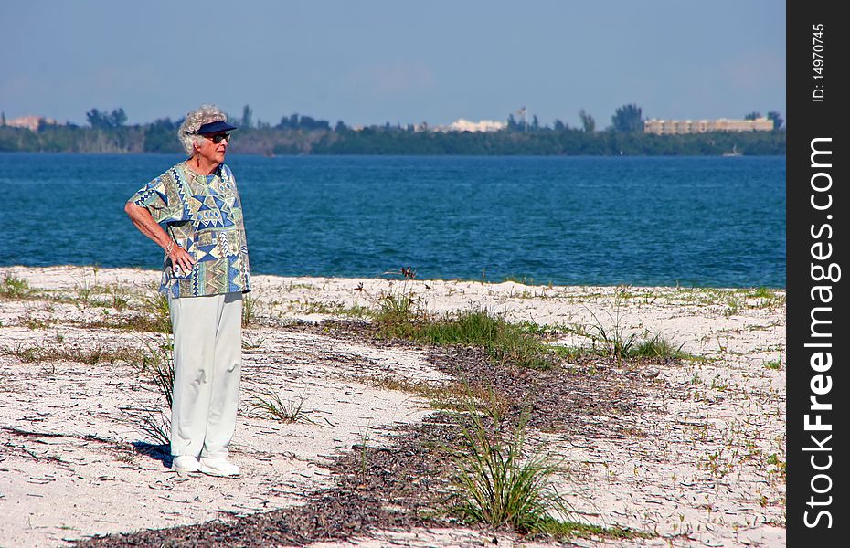 Senior woman on beach Sanibel Island Florida