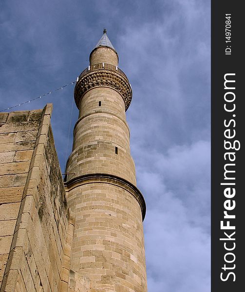 Cyprian sandstone minaret heading towards the blue sky