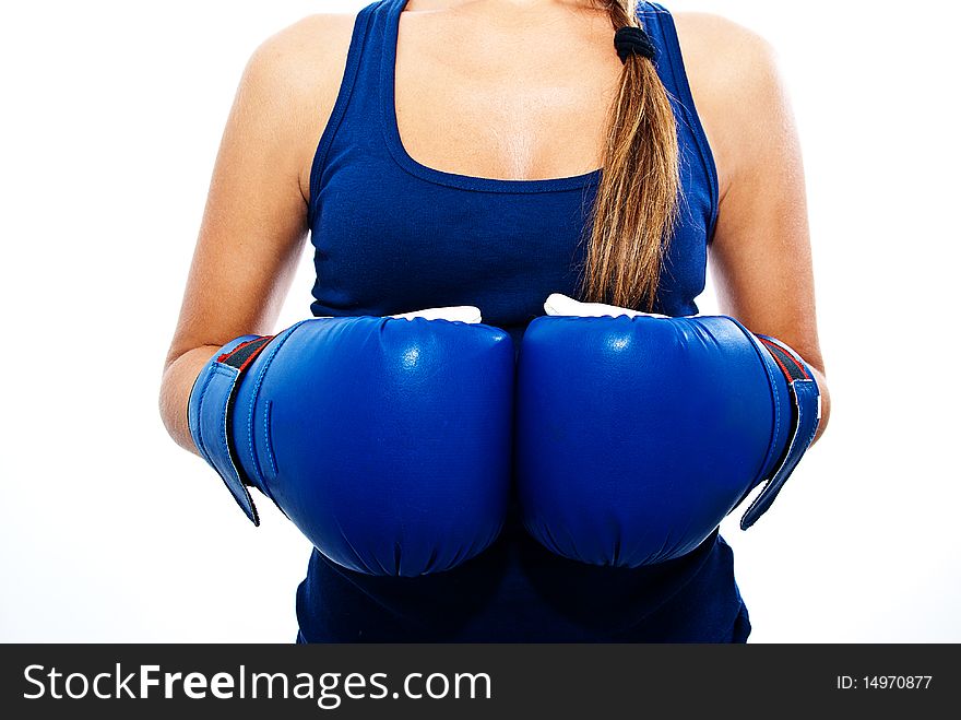 Girl showing blue boxing gloves. Girl showing blue boxing gloves
