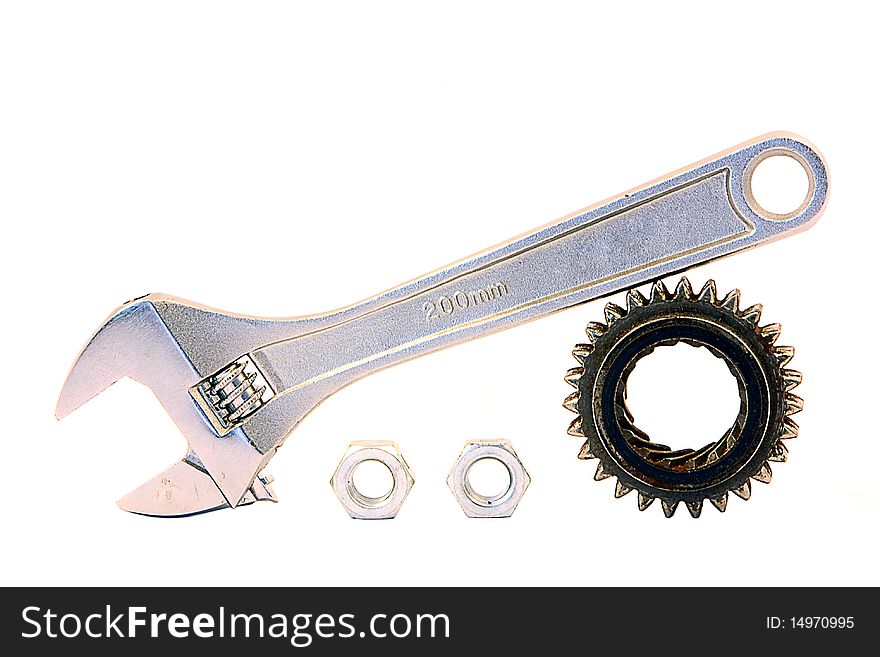 A 200mm spanner rests on top of a gear cog two nuts below it