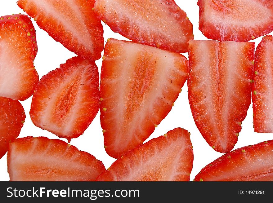 Pile of bright red ripe clean cut strawberries