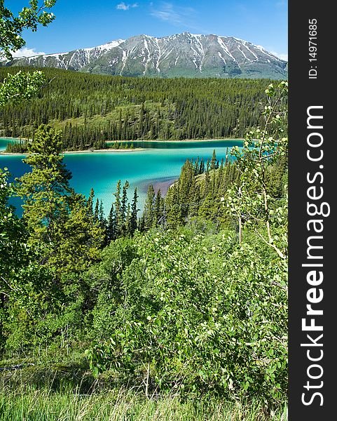 View of Emerald Lake from the road along the Yukon trail. View of Emerald Lake from the road along the Yukon trail