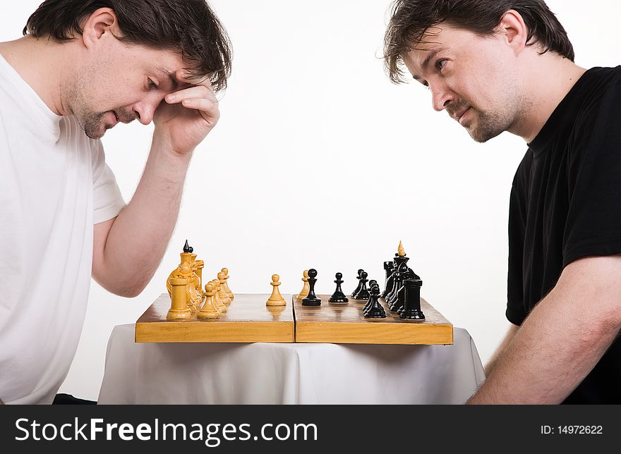 Two Men Play A Chess