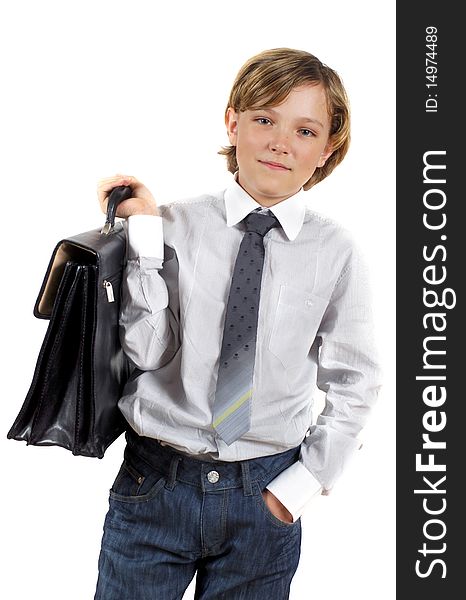 Portrait of cute schoolboy with suitcase isolated on white background