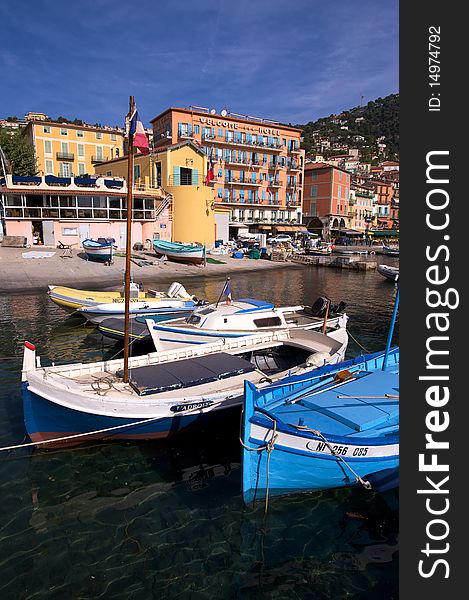 Small fishing boats in the harbour of Villefranche harbour in France