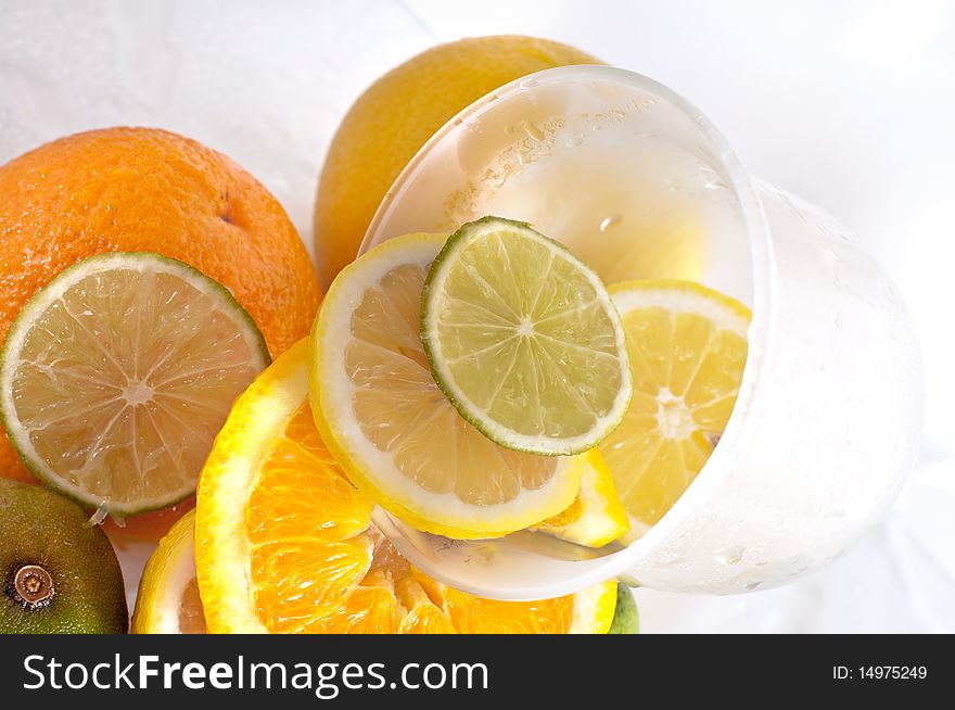 Tropical fruits in glass with ice. Tropical fruits in glass with ice