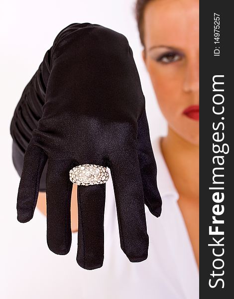 Close up of black satin gloves and ring