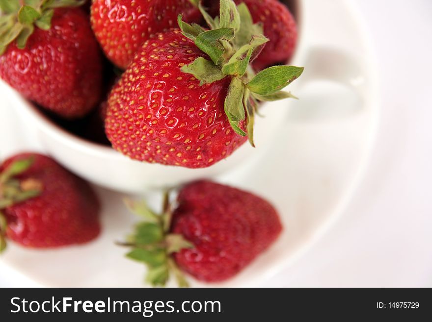 Fresh strawberries in  white cup. Fresh strawberries in  white cup