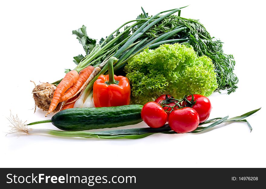 Raw juicy vegetables on white background