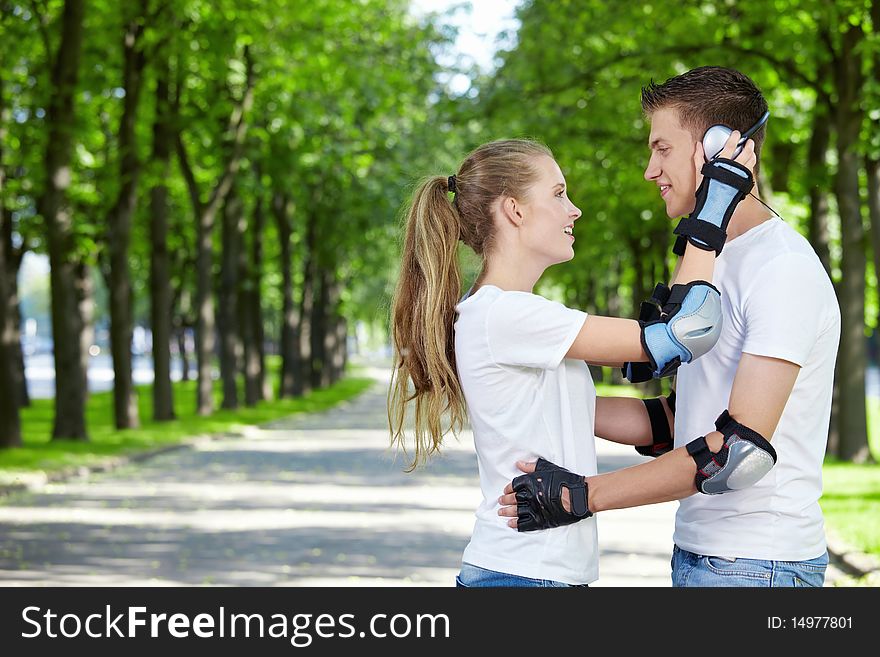 The girl in the outfit of a young boy wearing headphones. The girl in the outfit of a young boy wearing headphones