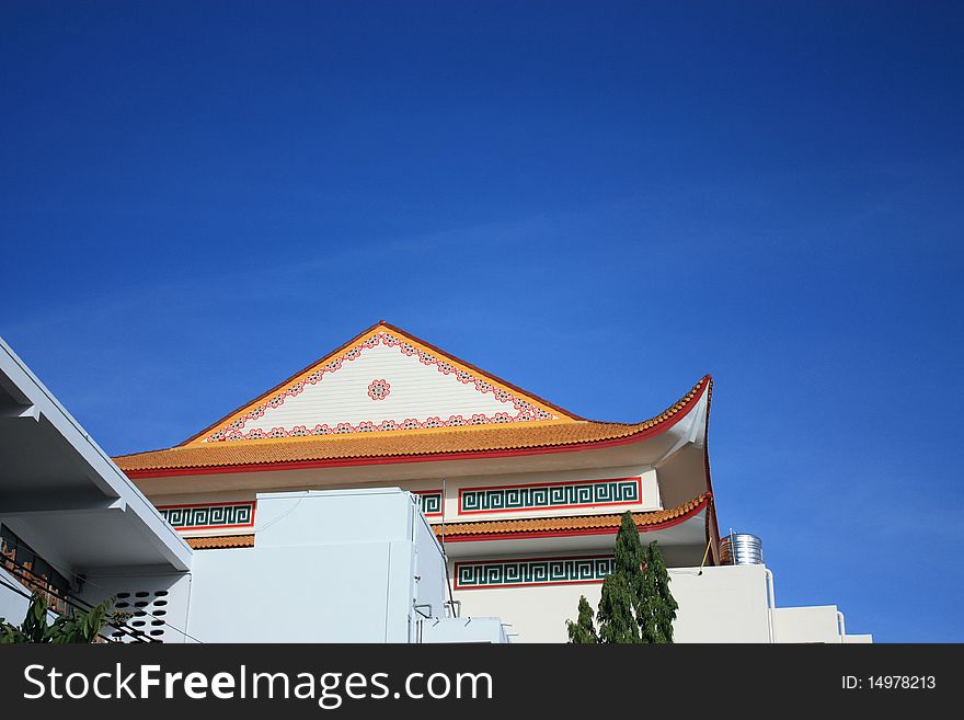 The roof with Chinese style with blue sky.