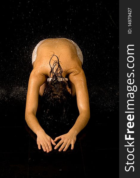 Full length portrait of a woman in water studio. Full length portrait of a woman in water studio