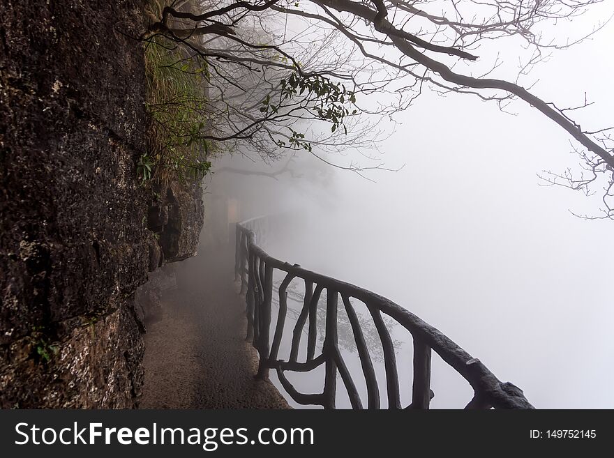 Sky walk at Tianmen Mountain vanishing in heavy mist, Zhangjiajie, China
