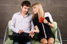 Young Man And Woman Sitting With A Laptop Stock Images Young Man And Woman Sitting With A Laptop Stock Images