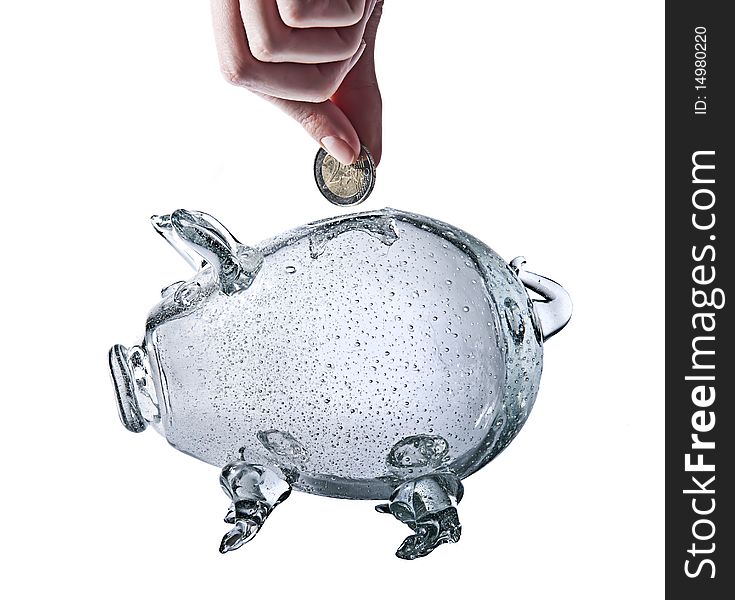 Photo of glass piggy bank on white background