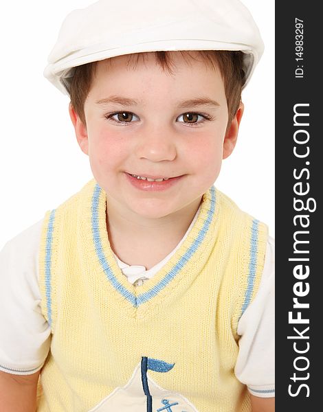 Close up of adorable three year old american boy in white hat. Close up of adorable three year old american boy in white hat.
