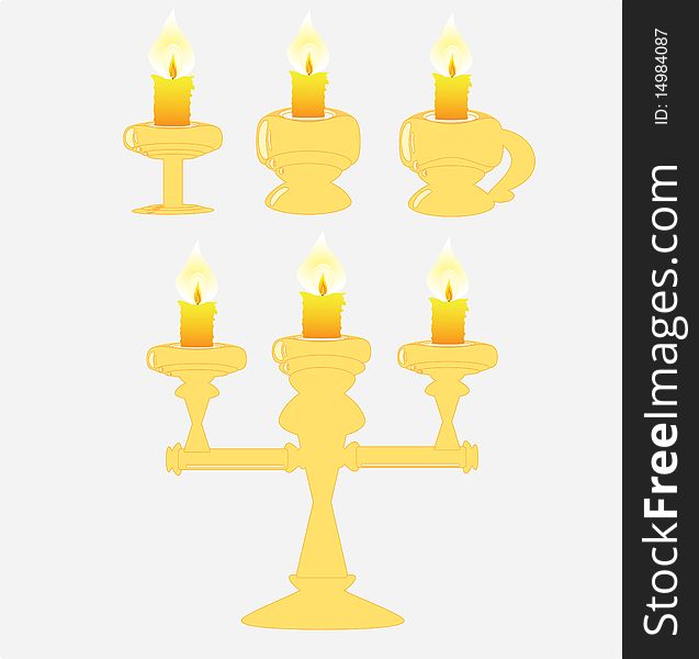 Antique chandelier with candles, in yellow