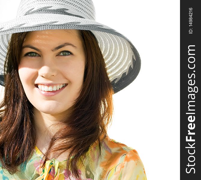 Smiling pretty girl in a hat isolated over white. Smiling pretty girl in a hat isolated over white