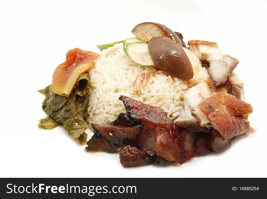 Hainan style rice with pork meat and vegetables. Hainan style rice with pork meat and vegetables