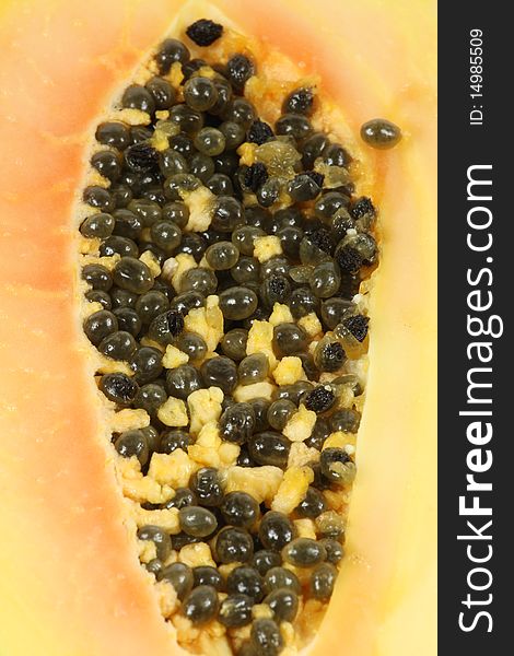 Half Papaya fruit isolated background.