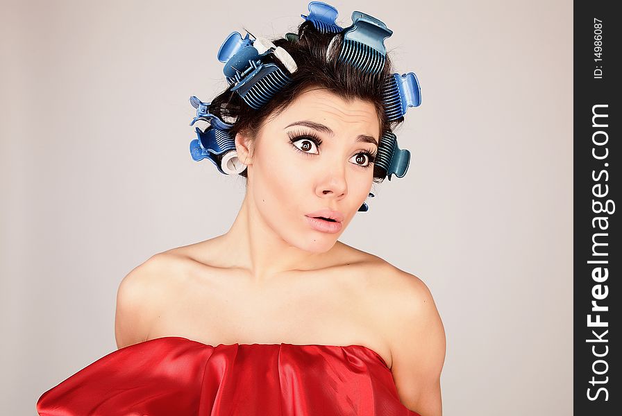 Emotional Girl With Hair-curlers On Her Head