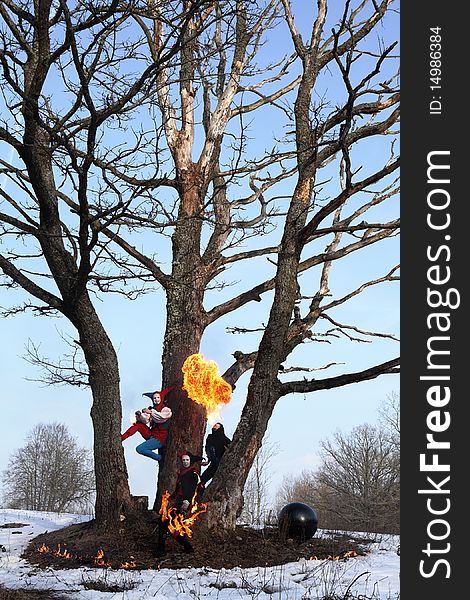 Ancient Art collective showing elements of fiery show. Outdoor photo.