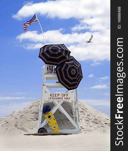 A lifeguard stand near the shoreline on the Eastern Seaboard, USA. A lifeguard stand near the shoreline on the Eastern Seaboard, USA