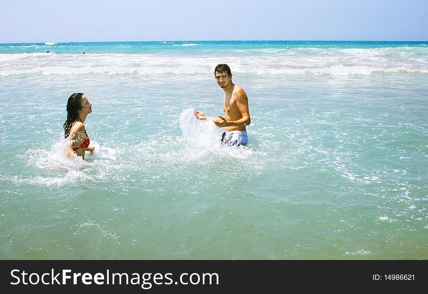 Couple in the sea on vacation.