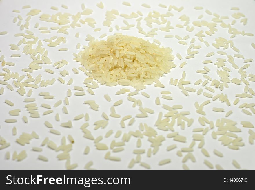 Pile of rice on white background. Pile of rice on white background.