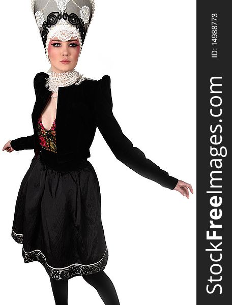 Attractive model in exclusive design clothes on manners old-slavic. Photo.