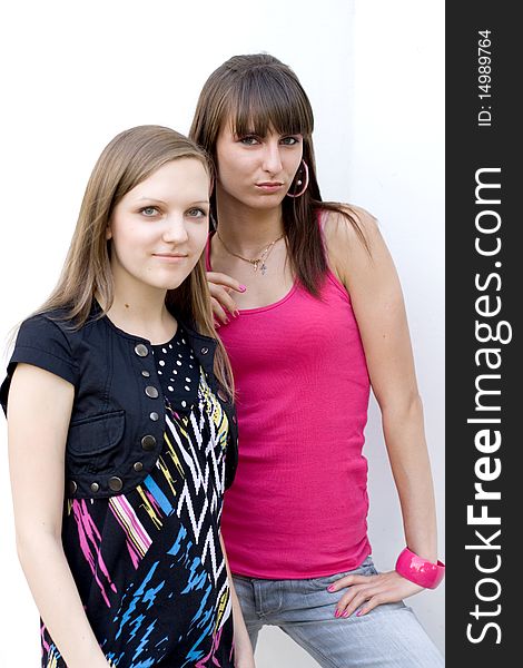 Two female friends posing outdoor