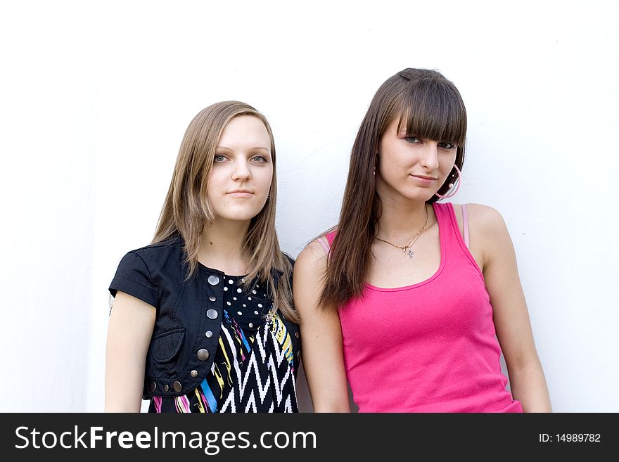 Two female friends posing outdoor