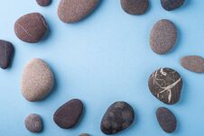 Copy Space Circle Of Pebbles Summer Background Top View On Blue Background Stock Images