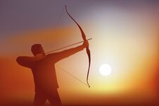An Archer Aims And Tends His Bow, Before Pulling His Arrow Towards His Target. Royalty Free Stock Images An Archer Aims And Tends His Bow, Before Pulling His Arrow Towards His Target. Royalty Free Stock Images