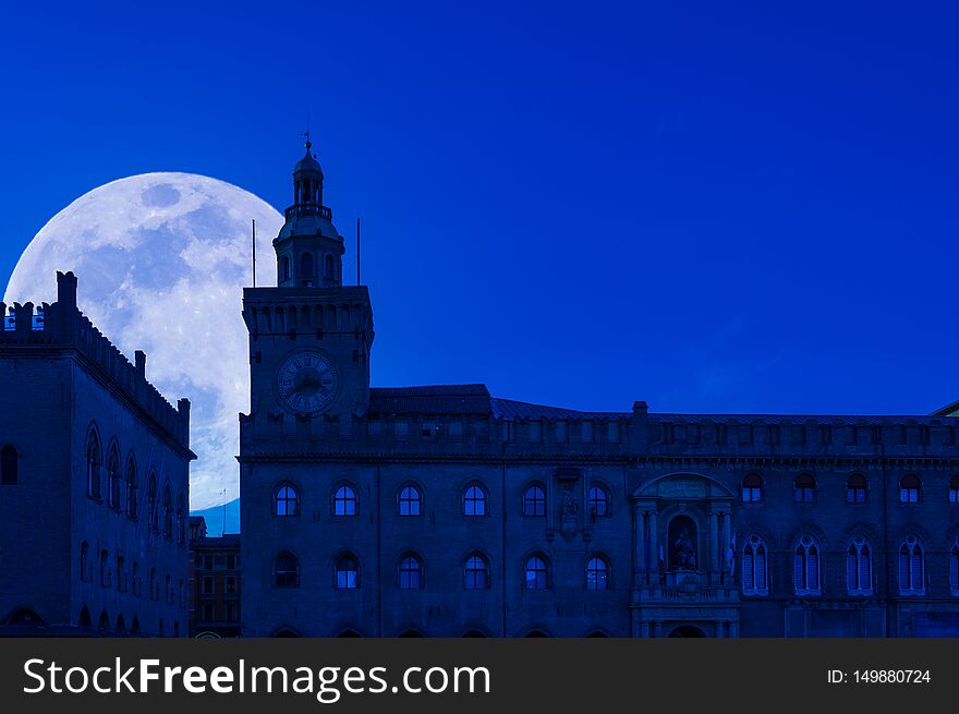 view of bologna at night with super moon, italy, tourism, architecture, landmark, europe, travel, emilia, romagna, city, medieval, old, town, ancient, evening, building, historic, italian, church, famous, tower, cityscape, urban, history, street, cathedral, square, center, facade