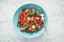 Tomatoes Salad With Basil Stock Photography