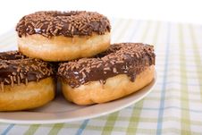 Three Donuts On A Plate, Chocolate Glazing Royalty Free Stock Image Three Donuts On A Plate, Chocolate Glazing Royalty Free Stock Image