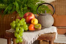 Beautiful Still Life Image Of Fruits And Teapot In Royalty Free Stock Images Beautiful Still Life Image Of Fruits And Teapot In Royalty Free Stock Images