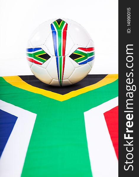 Image of a soccer ball on a south african flag. Image of a soccer ball on a south african flag