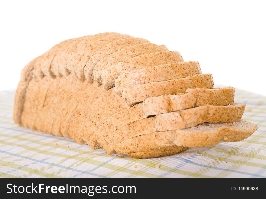 Sliced Wholemeal Brown Bread Placed On Linen Cloth