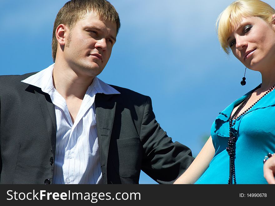 Portrait of a happy young couple in park