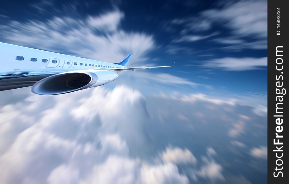 Airplane flying above perfect clouds with motion effect. Airplane flying above perfect clouds with motion effect