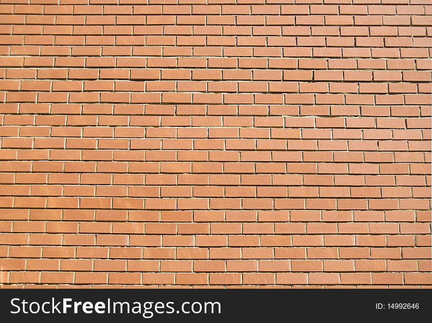 Red brick textured background. Side wall of the new building. Red brick textured background. Side wall of the new building.