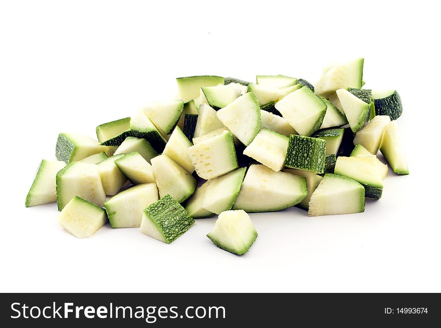 Pieces of zucchini grouped isolated on white background