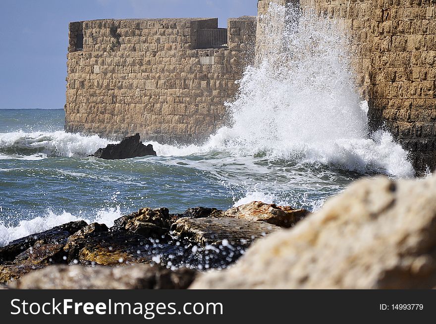 Storm and waves hit the walls of the castle. Storm and waves hit the walls of the castle