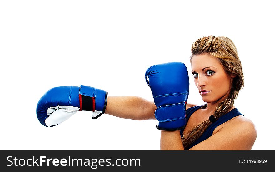 Profile blonde girl giving a blow in boxing on a white background. Profile blonde girl giving a blow in boxing on a white background